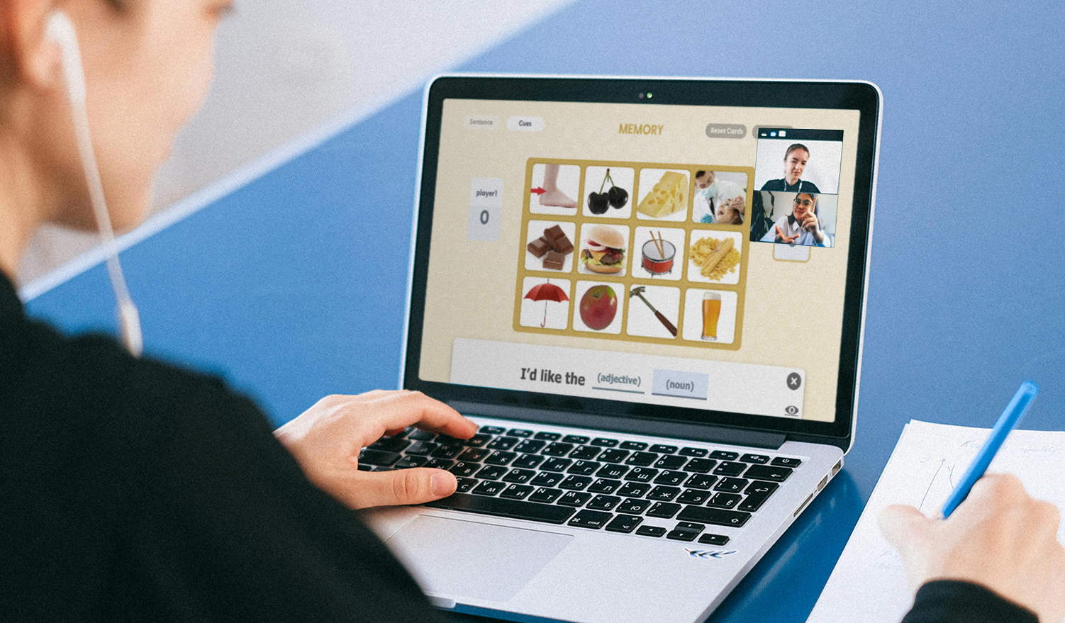 Person using M-MAT Tele on a laptop